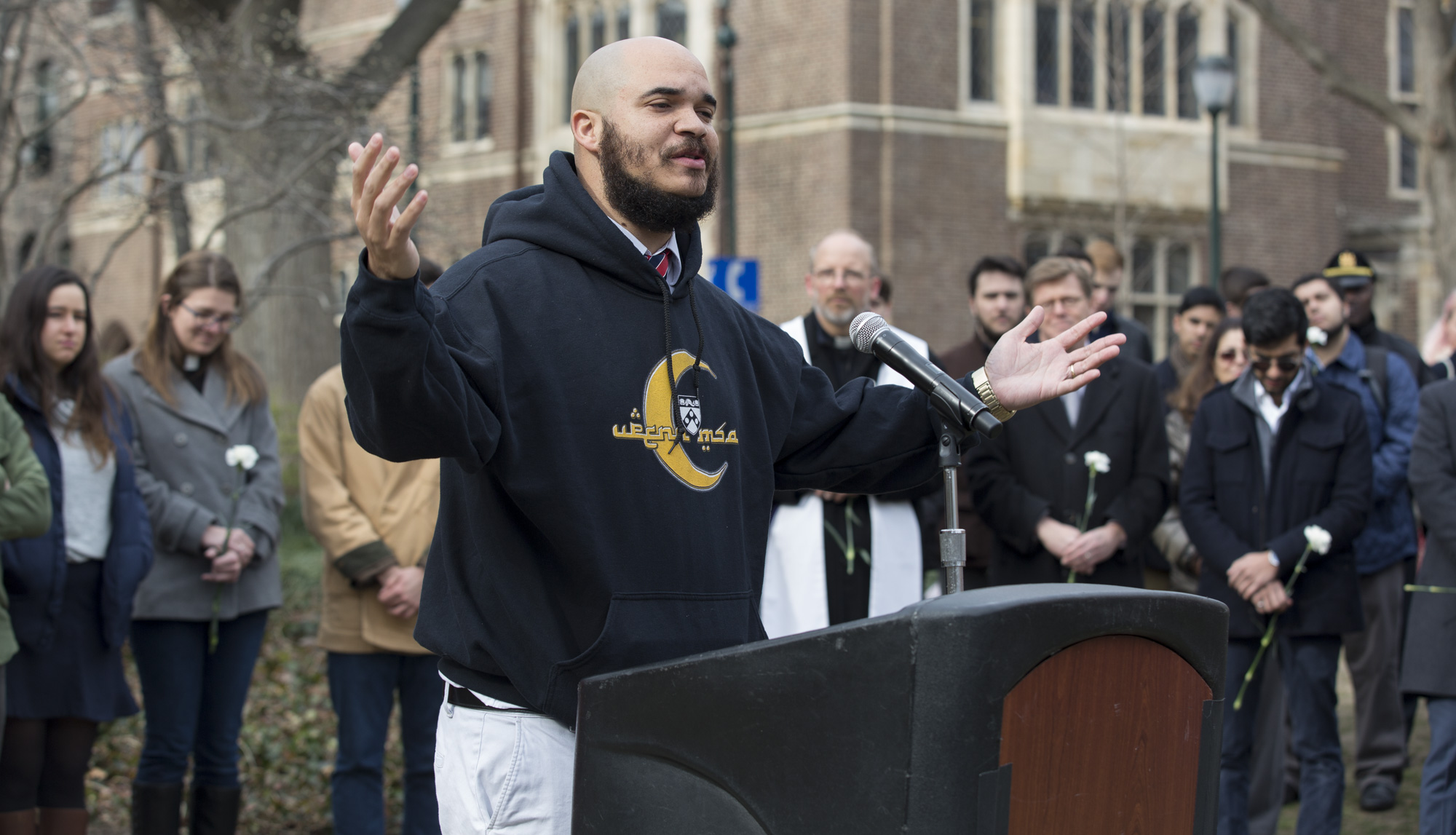 Reverend Charles Howard conducts an interfaith service on College Green